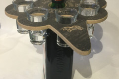 Shotbrett på flaske med glass
